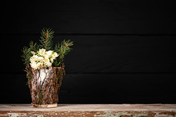 Flowers in decorative vase. Leucojum vernum is the first spring snowflake, studio shot. Theme of International Womens Day
