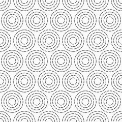 Abstract seamless pattern of dotted circles.