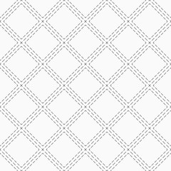 Abstract seamless pattern of dotted rhombusess.