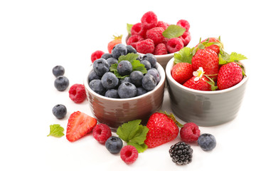 strawberry, blueberry and raspberry isolated on white background