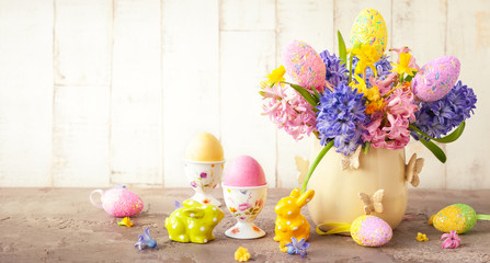 Easter breakfast table with flowers and  Easter decor