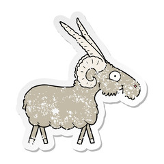 distressed sticker of a cartoon goat
