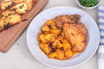 Rustic potato stew with chicken - a traditional rural French and Italian dish