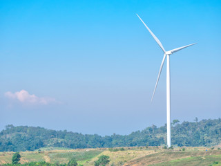Wind turbines are spinning to generate electricity.