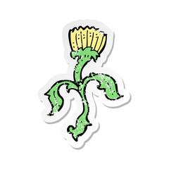 retro distressed sticker of a cartoon flower