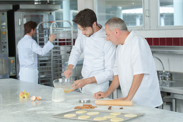 motion chefs of a restaurant kitchen