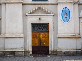 Oak wood entrance on local catholic church.