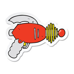 sticker of a cartoon ray gun
