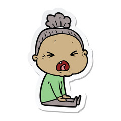 sticker of a cartoon angry old woman