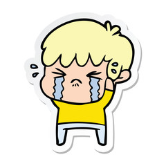 sticker of a cartoon boy crying