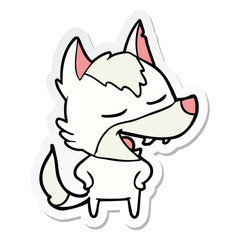 sticker of a cartoon wolf laughing