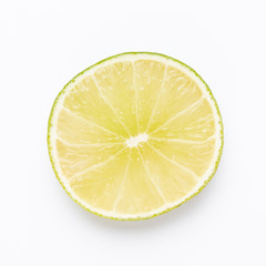 Composition with fresh ripe limes on light background, top view