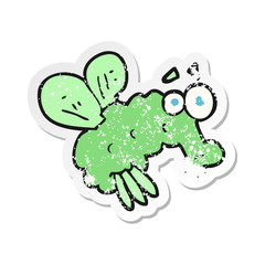 retro distressed sticker of a cartoon fly