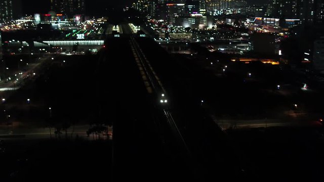 High-speed train passing through the station, night scenery, Object of Interest