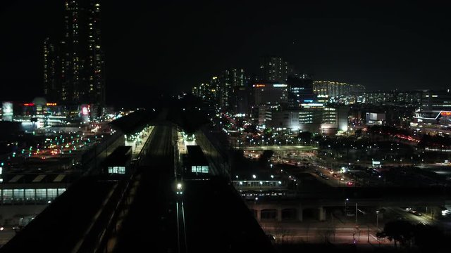 Top view of train, High-speed train passing through the station, night scenery