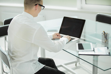 close up. businessman working in a modern office