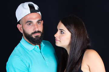 Two man woman couple standing in poses looking disappointed