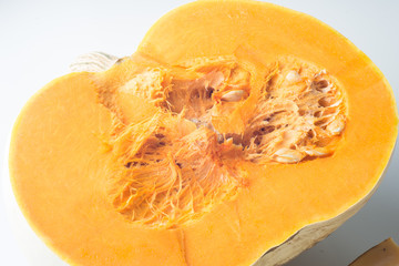Half of pumpkin isolated on white background