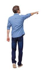 Back view of a man walking with a pointing hand.