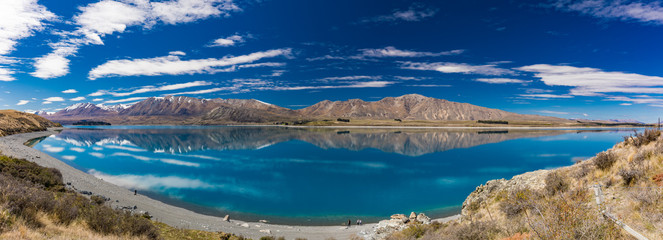 Lake Tekapo with reflection of sky and mountains, New Zealand