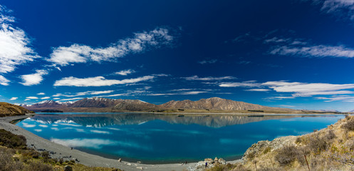 Lake Tekapo with reflection of sky and mountains, New Zealand