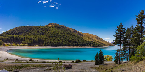 Lake Tekapo with reflection of sky and mountains, New Zealand