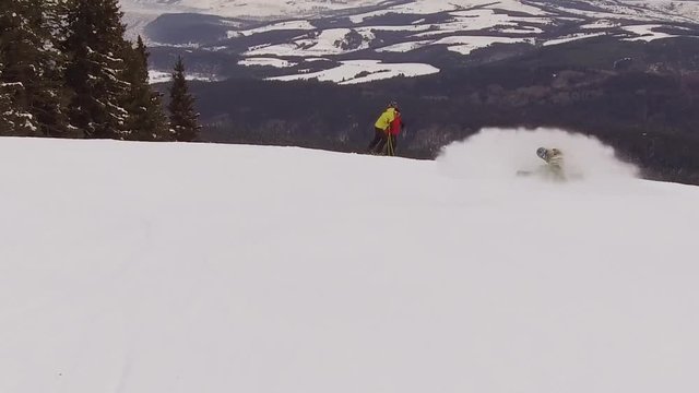 Snowboarding snow spraying