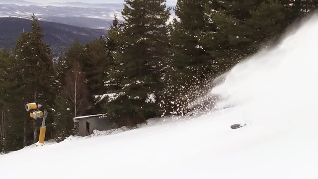 Snowboarding snow spraying