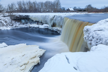 Beautiful frozen waterfall in winter. Jagala, Estonia, Eastern Europe.