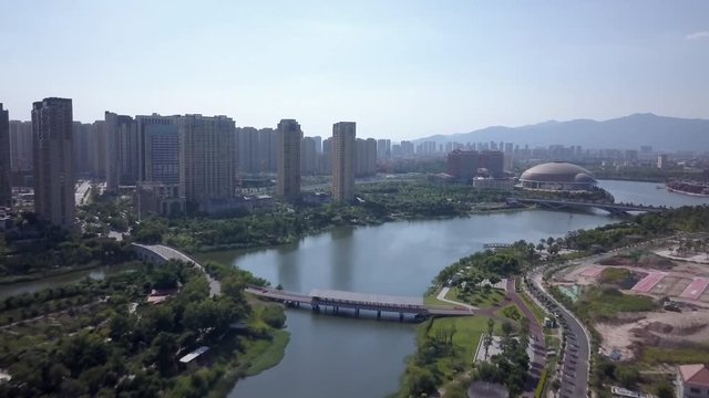 Aerial view on beautiful city landscape, with river on the middle.New neighborhood in modern Chinese city.