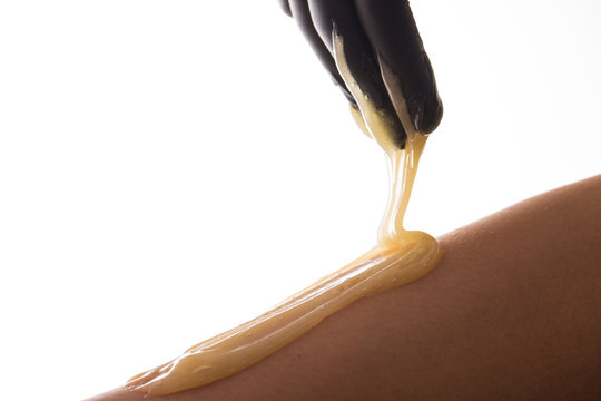 Hair removal process on female leg with epilation