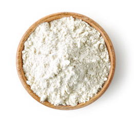 Fototapeta na wymiar wooden bowl of flour