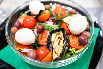 salad from cherry tomatoes with mozzarella cheese