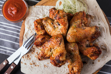 Grilled chicken wings. Closeup. Top view