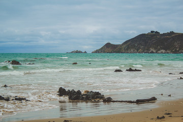 empty beach near Dunedin, South Island, New Zealand