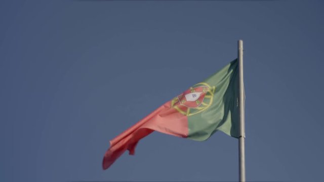 Portugese Flag Waving in the Wind | 4K - NORMAL STYLE - MEDIUM CLOSE SHOT