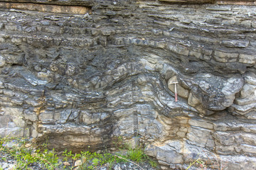 Geological hammer on the rocks