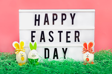 Easter eggs cute bunny on blue backgroung. Funny decoration. Happy Easter concept