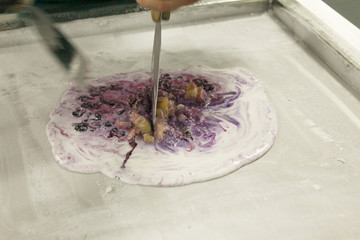 Process of making fried ice cream. Dessert of handmade ice cream.