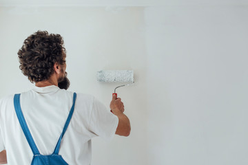 Man whitewashed house