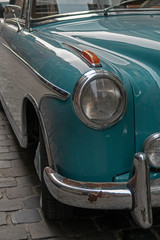 Obraz na płótnie Canvas Detail of classic teal car