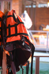 Life jacket hanging in floating hotel houses