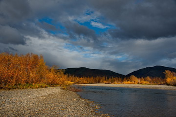 Russia. far East. The colours of autumn are cold-water rivers of Magadan.