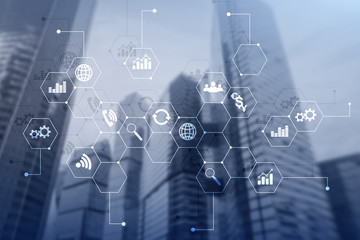 Double exposure mixed media. Diagrams and icons on hologram screen. Business people and modern city on background.