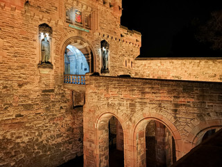 Edinburgh castle at night with the historic red Lion rampant crest - Translation of the latin Nemo me impune lacessit : No one can harm me unpunished