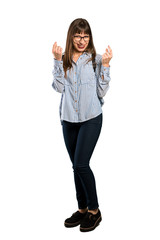 Full-length shot of Woman with glasses making money gesture