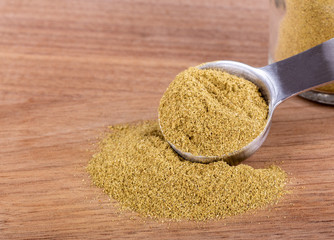 Ground Oregano on a Wooden Table