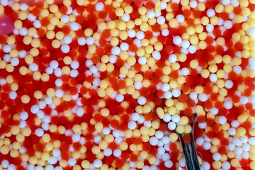 Sweetmeat with colorful ball flour , Thai style food. Street food in local market, Thailand. Thai dessert with colorful ball flour, is one of snack that usually will eat with coconut milk.