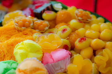 Many Thai desserts are arranged in a beautiful and appetizing dish.