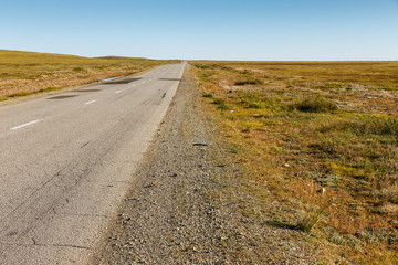 asphalt road in the Mongolian steppe